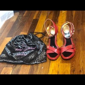 Red designer Baby Phat heels